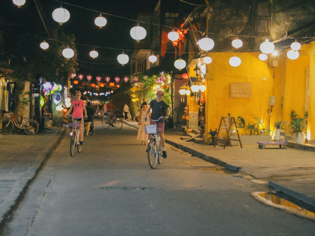Tourists are riding bicycle in Hoi An Town, Hoi An tour
